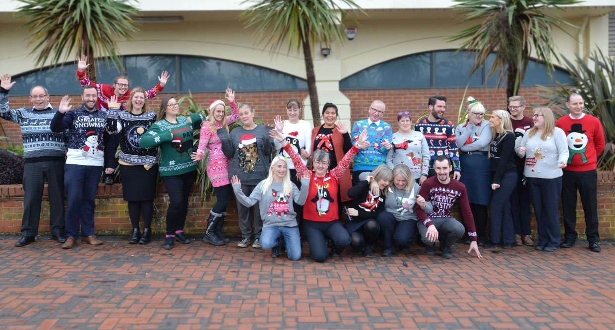 Roys staff wearing their Christmas Jumpers