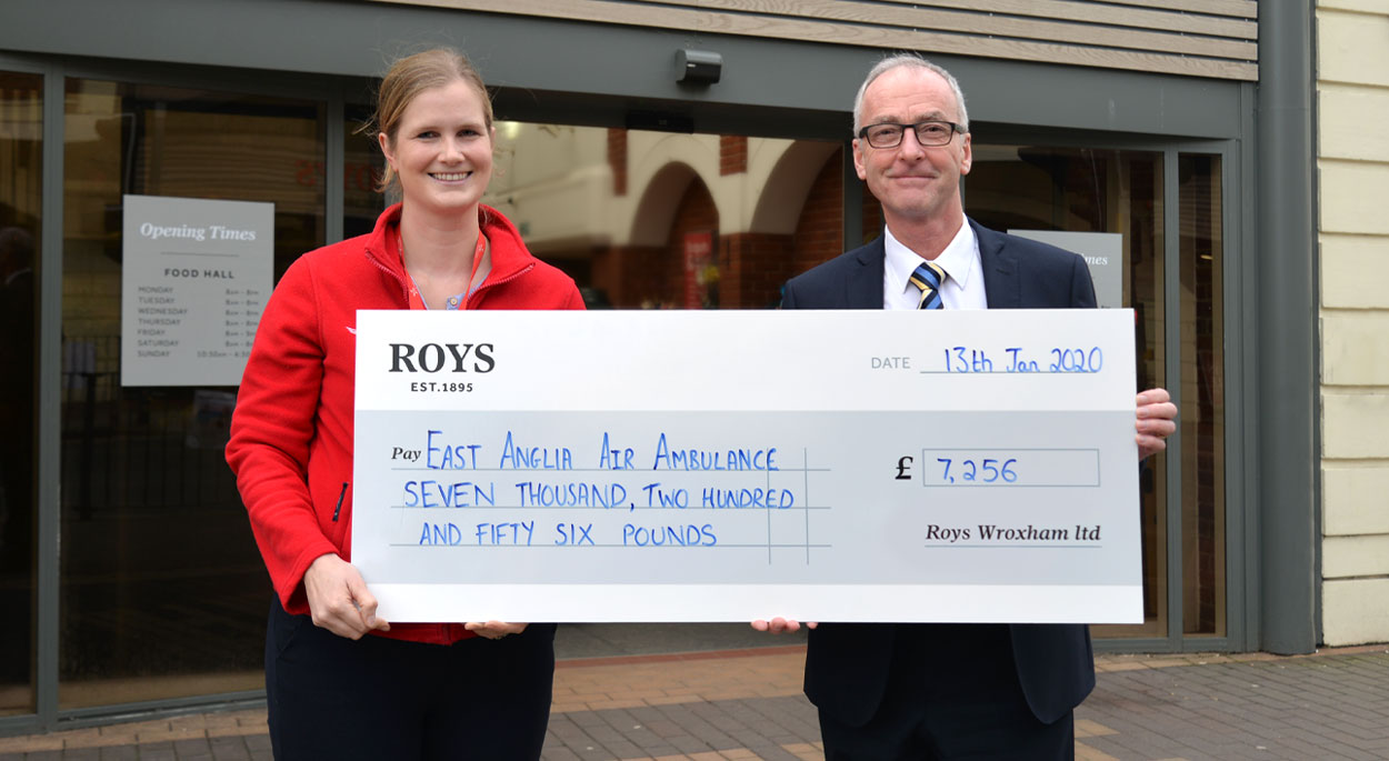 Chris Green - Wroxham General Manager, presenting a cheque to Sophie Williams - East Anglian Air Ambulance Community Fundraising Manager