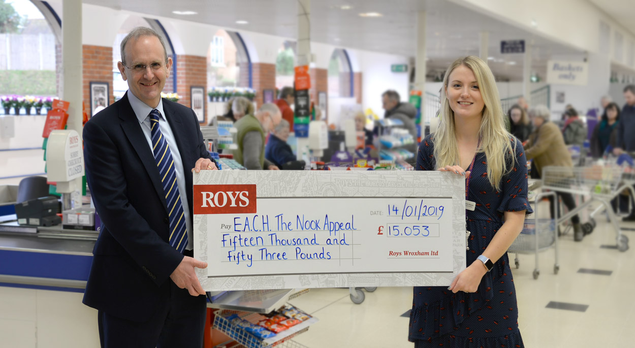 Photo left to right: Ed Roy – Managing Director Roys (Wroxham) Ltd, Sophie Mayes- Corporate Fundraiser for E.A.C.H.